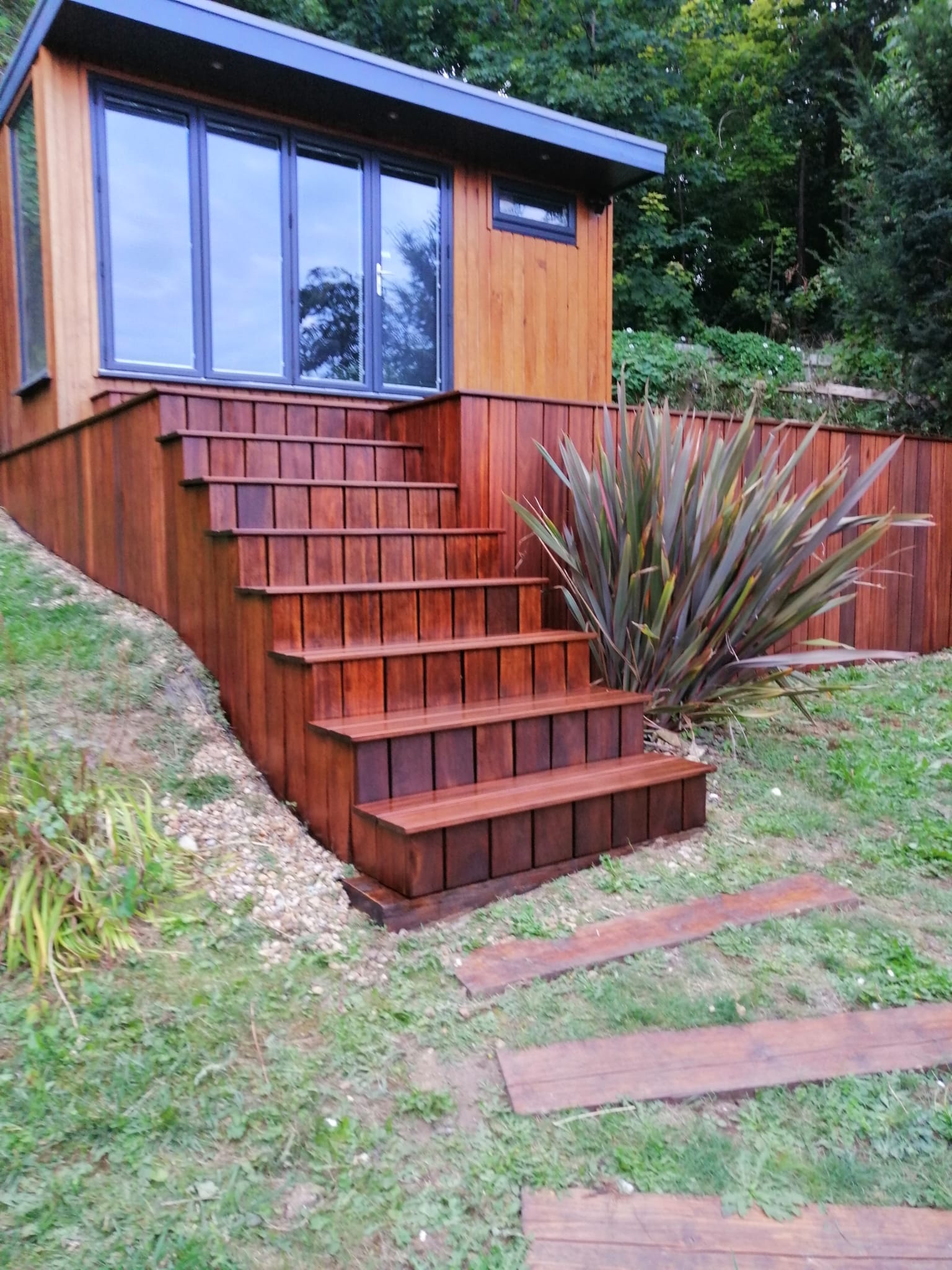 Wooden deck in need of cleaning.